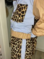 CASUAL TROUSERS IN ANIMAL PRINT AND STRIPE DETAIL - Image 8